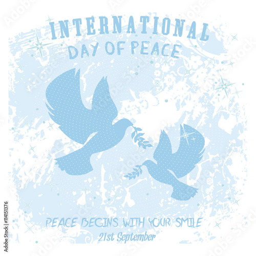 Doves with olive branch on a subtle grungy white floral artwork for International Peace Day