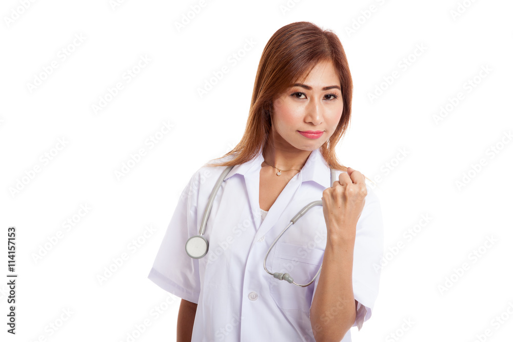 Portrait of confidence young female doctor hold fist Portrait of confidence young female doctor hold fist