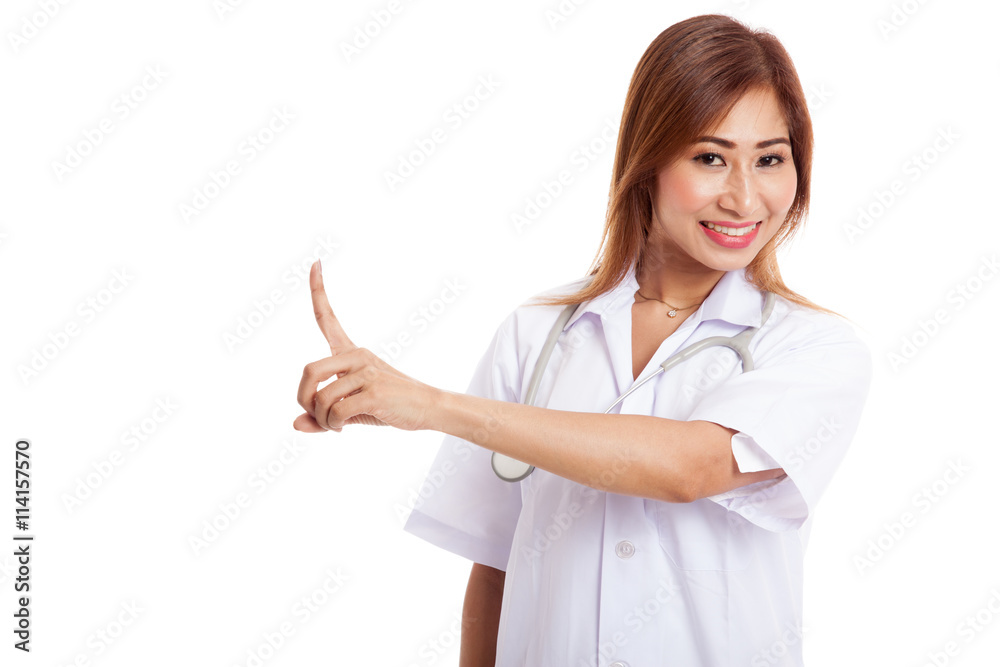 Asian young female doctor point to space on her left Asian young female doctor point to space on her left