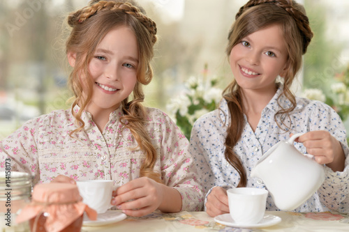 little girls drinking tea