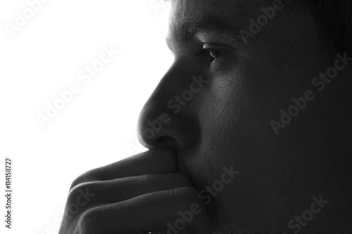 sad man silhouette on a white background