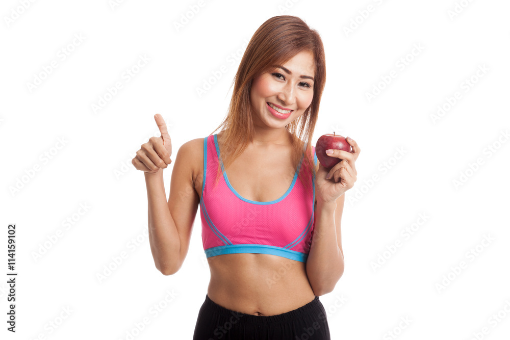 Beautiful Asian healthy girl thumbs up with red apple Beautiful Asian healthy girl thumbs up with red apple