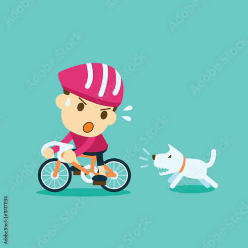 a dog chasing cyclist