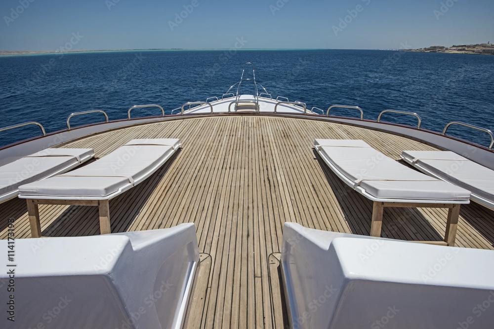 Fototapeta premium View over the bow over a large luxury motor yacht