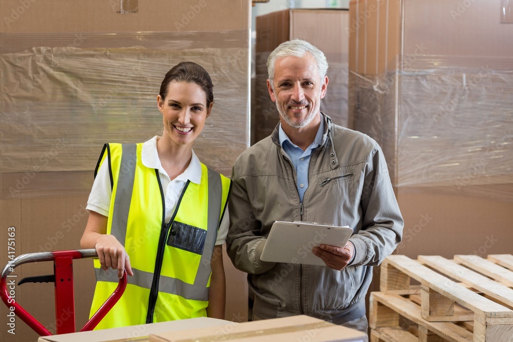 Portrait of manager and worker are smiling and posing 
