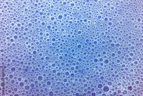 detergent foam bubble with purple tone for background