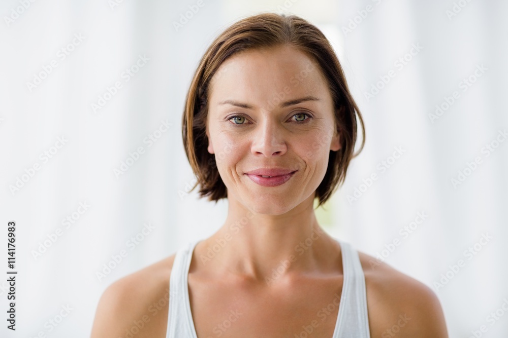 Portrait of smiling woman in fitness studio Portrait of smiling woman in fitness studio