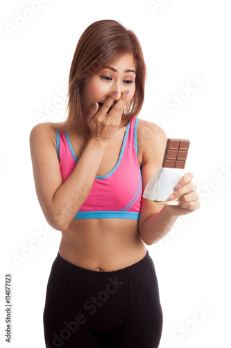 Beautiful  healthy Asian girl veary happy with chocolate photo