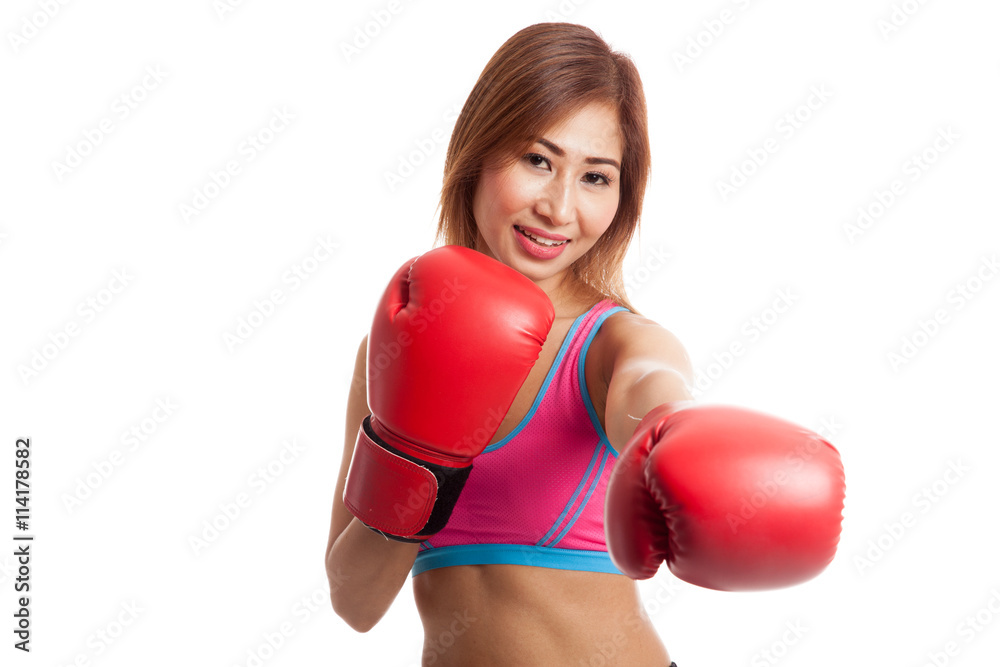 Beautiful healthy Asian girl with red boxing glove Beautiful healthy Asian girl with red boxing glove