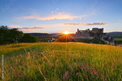 Ruin of a medieval castle over Beckov village in Slovakia. photo