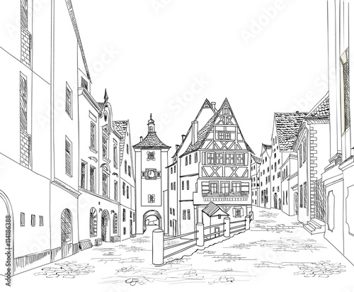 Street with old buildings and cafe in old city. Old city view. Travel Germany background