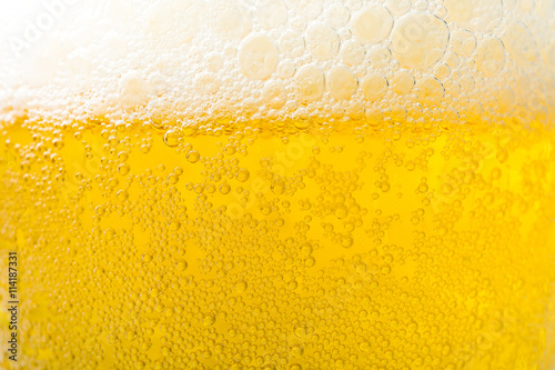 Background  texture of frosty beer with foam and bubbles