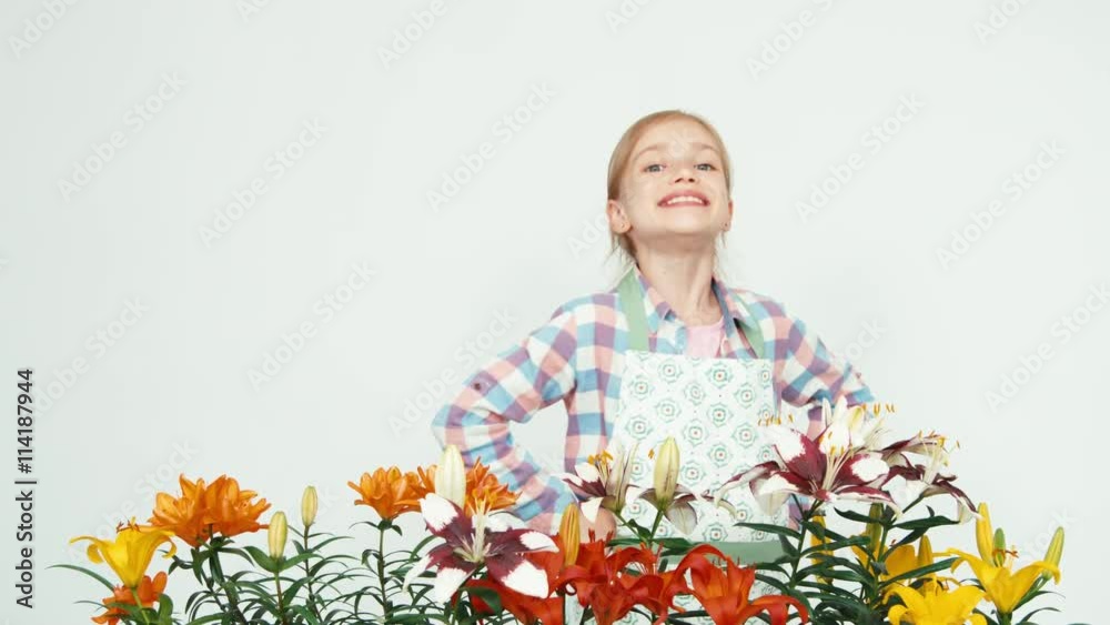 Close up portrait flower-girl smiling with teeth at camera Close up portrait flower-girl smiling with teeth at camera