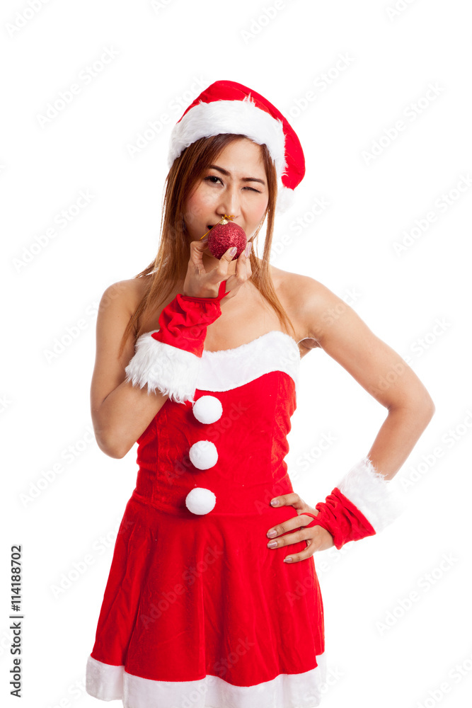 Asian Christmas girl with Santa Claus clothes with bauble ball