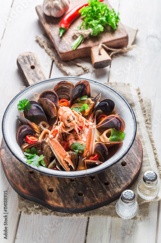 Tasty seafood soup with shrimps and mussels