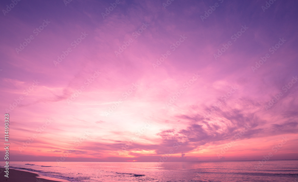 Beautiful sunrise sky on tropical beach. purple filter