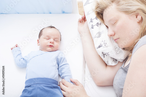 Mother and baby co-sleeping safely photo