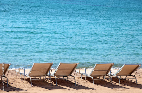 Beachfront with beachchairs © jc_studio