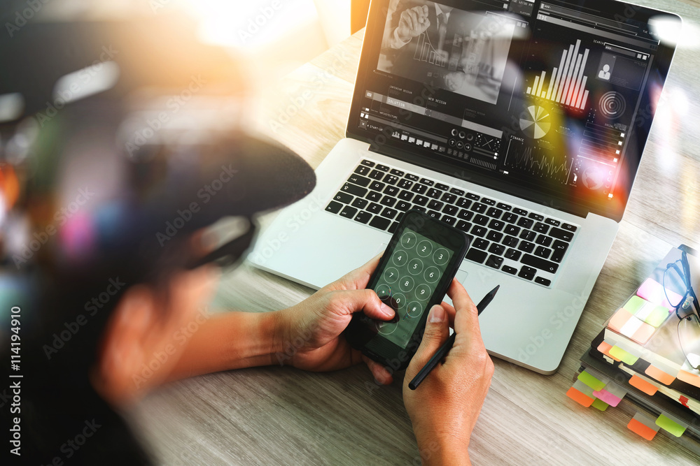 Fototapeta premium designer hand attending video conference with laptop computer an