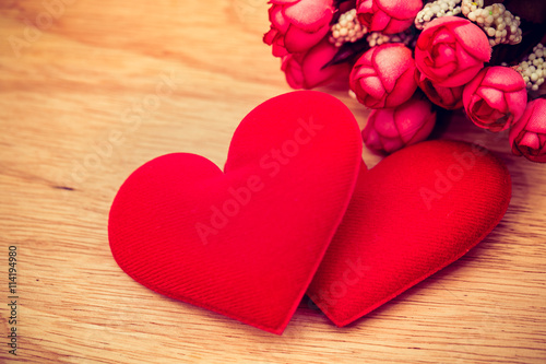 Valentine day background, red love heart on wooden background