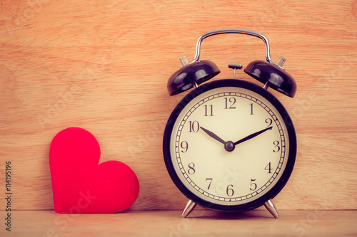 Valentine day. Alarm clock and love heart