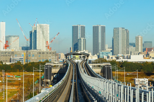 Cityscape from Yurikamome monorail in Odaiba, Tokyo photo