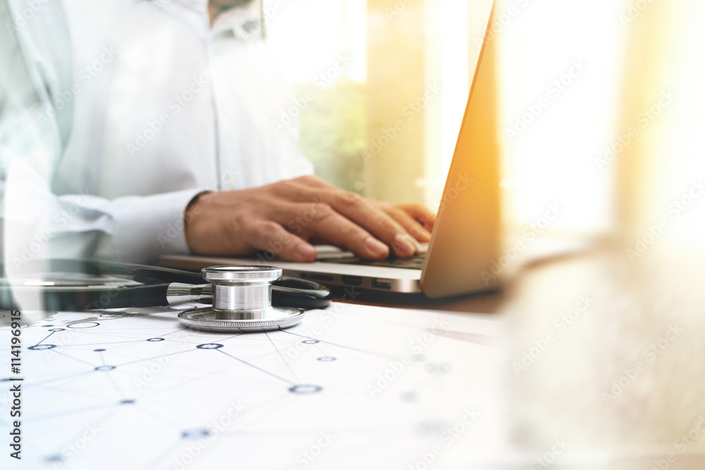 Medicine doctor hand working with modern computer interface as m