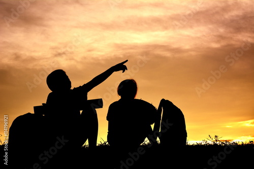 Silhouette children at sunset. Concept travel