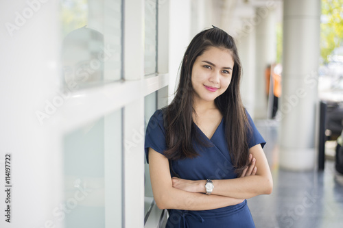 A portrait of an Asian university student on campus Free Download A portrait of an Asian university student on campus - GFXLoad