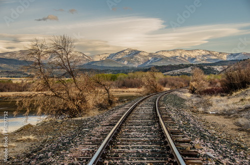 Curve in the Tracks as they head towards the mountains © Sue Smith