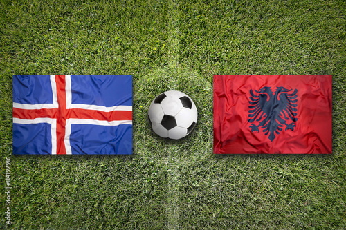 Iceland vs. Albania flags on soccer field