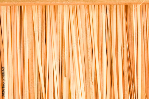 Fototapeta Naklejka Na Ścianę i Meble -  close up artificial thatch texture,dry grass background