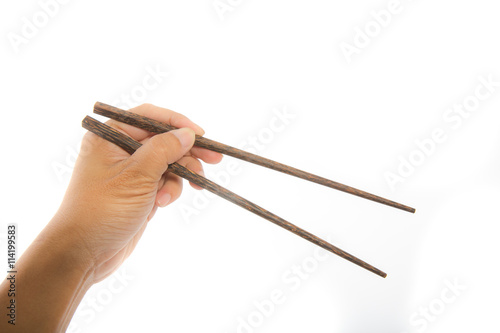 Hand hold chop stick on white background