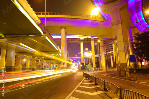 Empty road floor with city elevated bridge of night