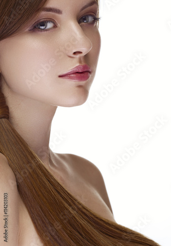 Make up and beauty. Girl with light make up on white background