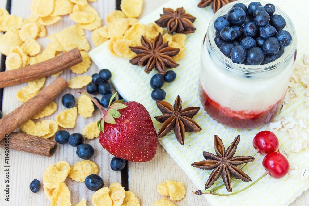 yogurt strawberry cherries and blueberries corn flakes yogurt strawberry cherries and blueberries corn flakes