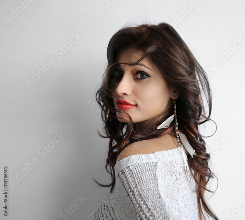 Attractive indian brunette woman isolated on white background