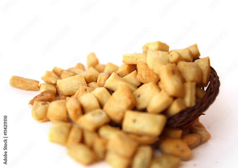 A pile of salted mixed snacks, namak pare, background. A pile of salted mixed snacks, namak pare, background.