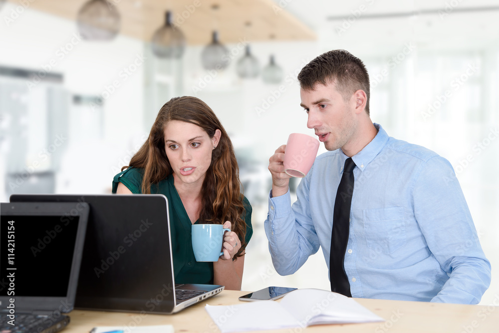 Business people Having Meeting Around Table In Office Business people Having Meeting Around Table In Office