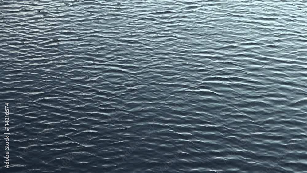 Amazing close up nature texture of running ripple on the water. Cinematic moving background with meditative and hypnotic effect. Amazing close up nature texture of running ripple on the water. Cinematic moving background with meditative and hypnotic effect.
