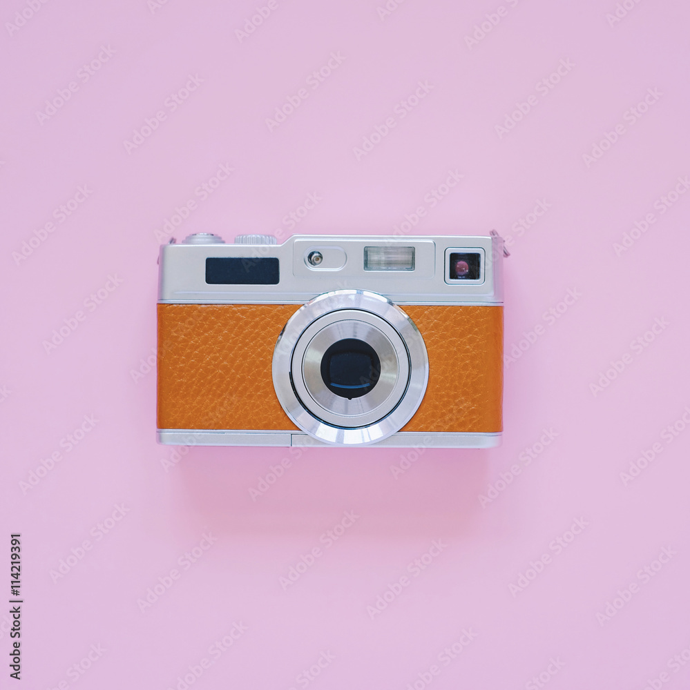 Vintage camera look on pink background, minimal style