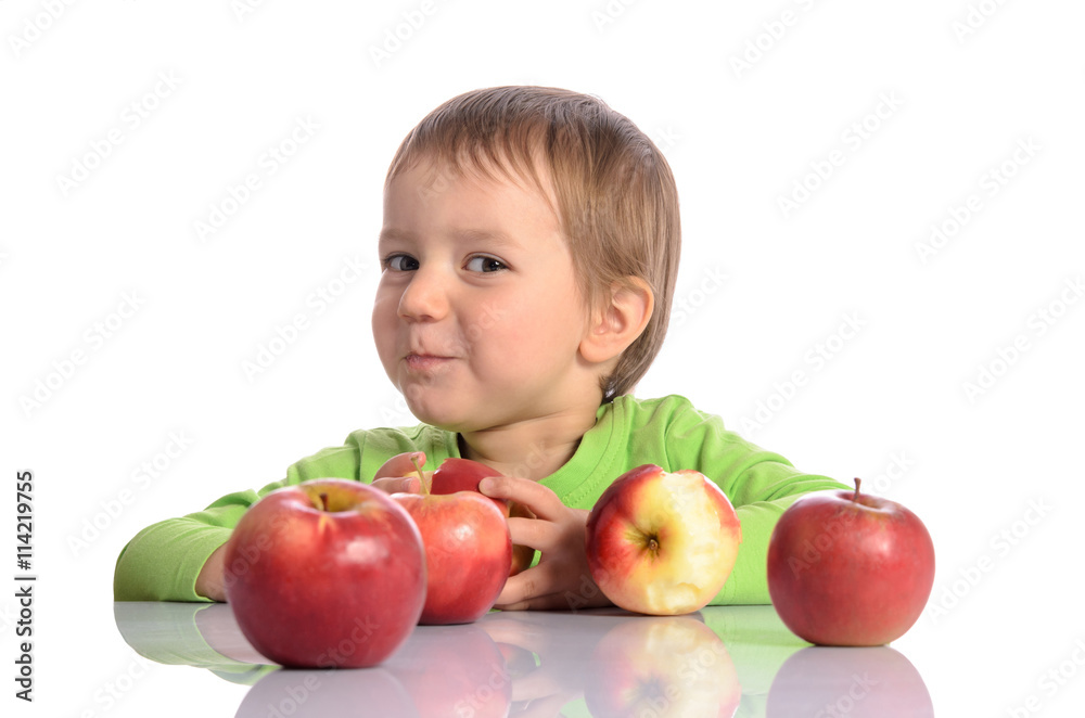 Cute child with red apples on white background Cute child with red apples on white background