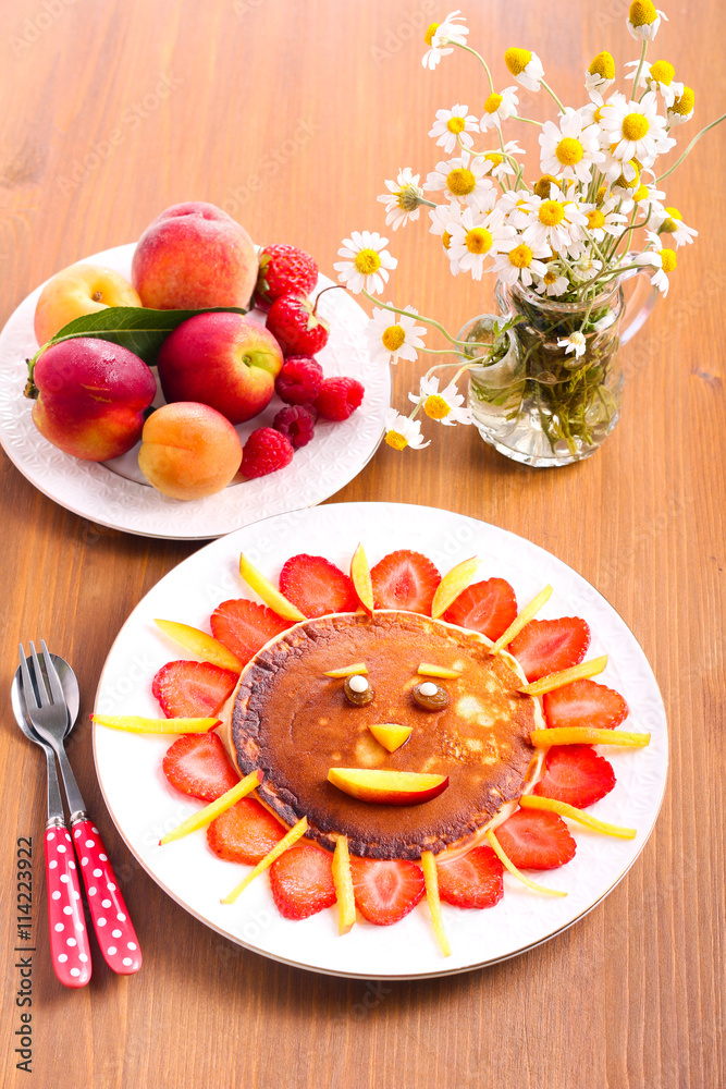 Pancake with strawberry and fruit