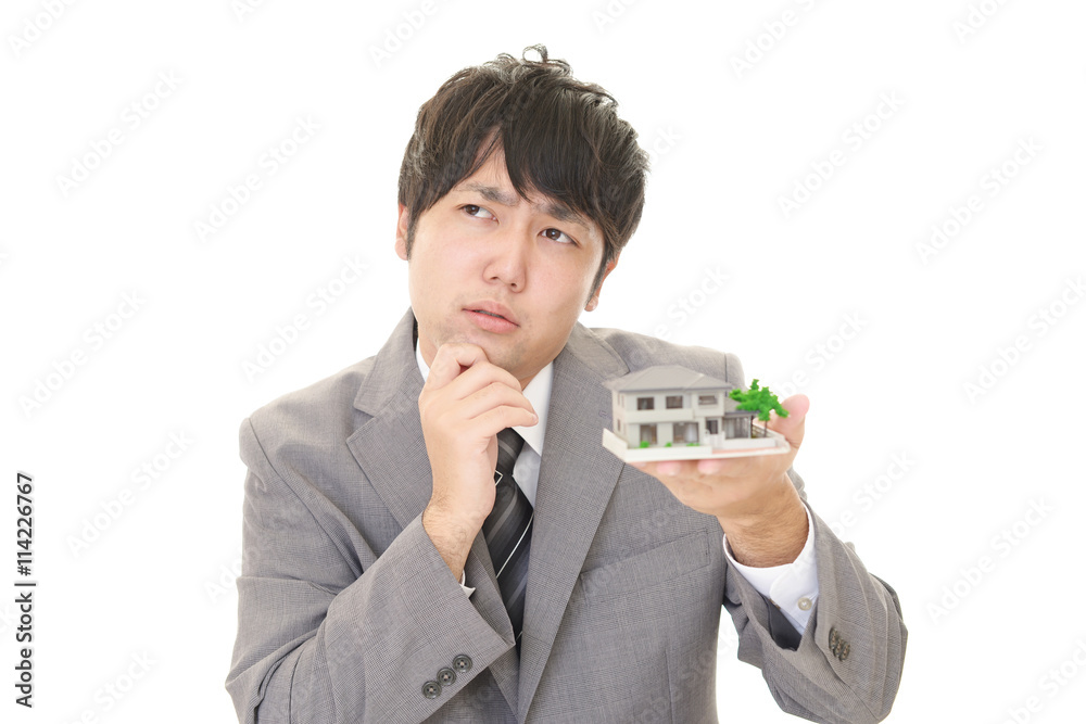 悩むビジネスマン 悩むビジネスマン