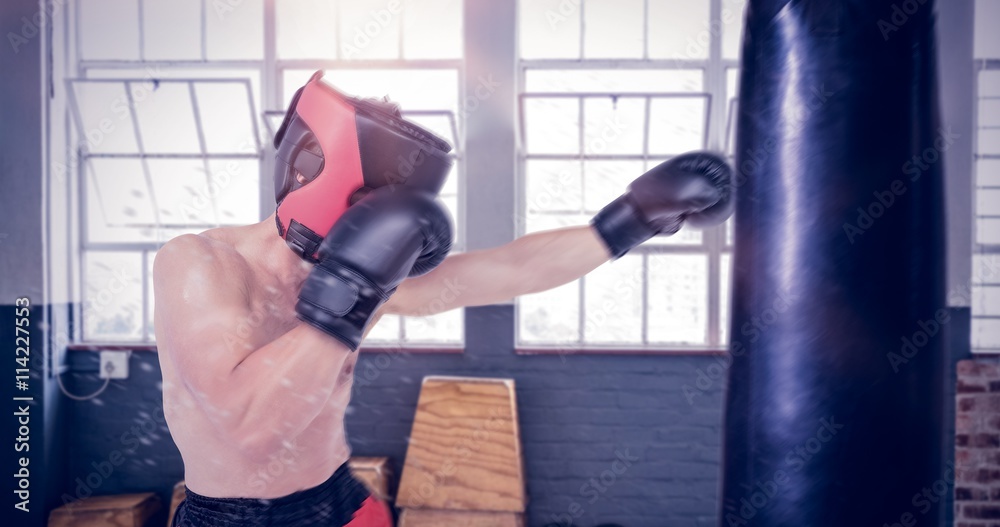 Composite image of side view of boxer hitting straight