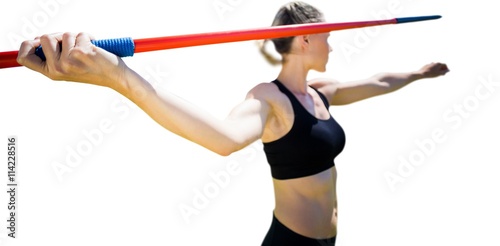 Close up of sportswoman hand holding a javelin 