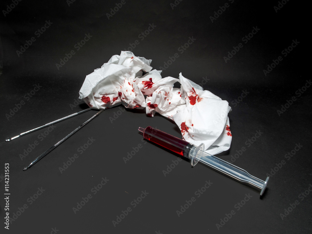 Paper bloody syringes and instruments..Trauma wounds, bleeding Paper bloody syringes and instruments..Trauma wounds, bleeding