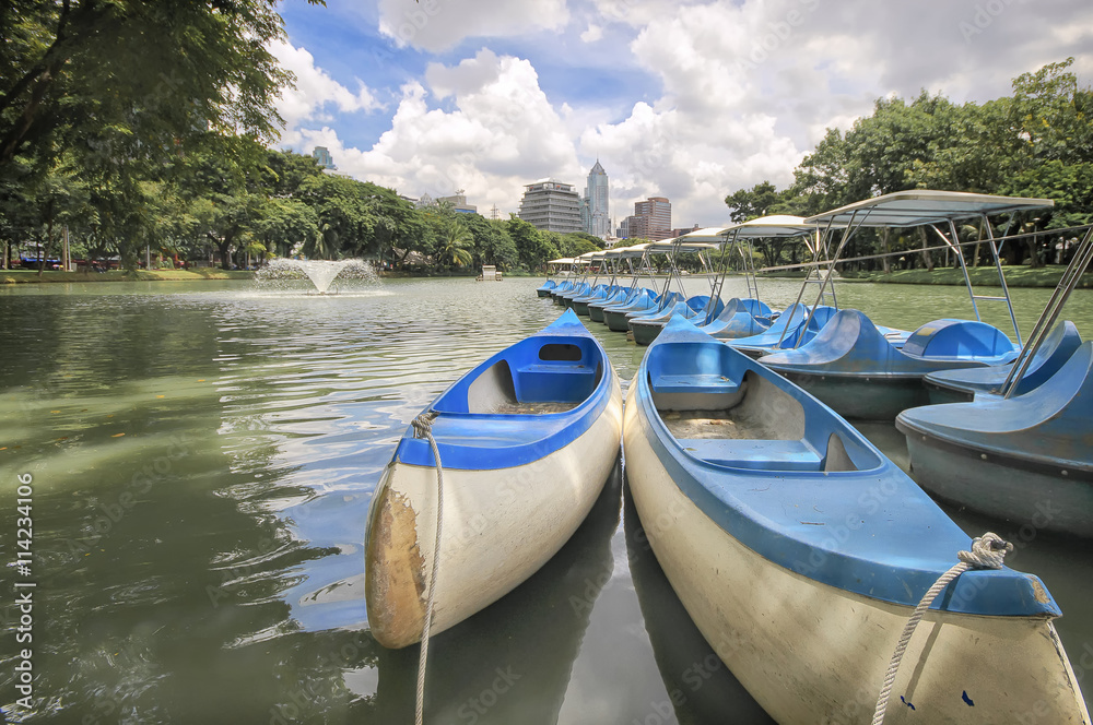 BANGKOK, THAILAND - SEPTEMBER 11: Canoe boats for rent at Lumphini Park located under Ratchadamri Road, near Silom MRT Station and  Saladaeng BTS station in BANGKOK THAILAND on SEPTEMBER 11, 2012