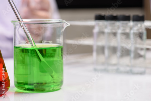 Laboratory research, flask containing chemical liquid