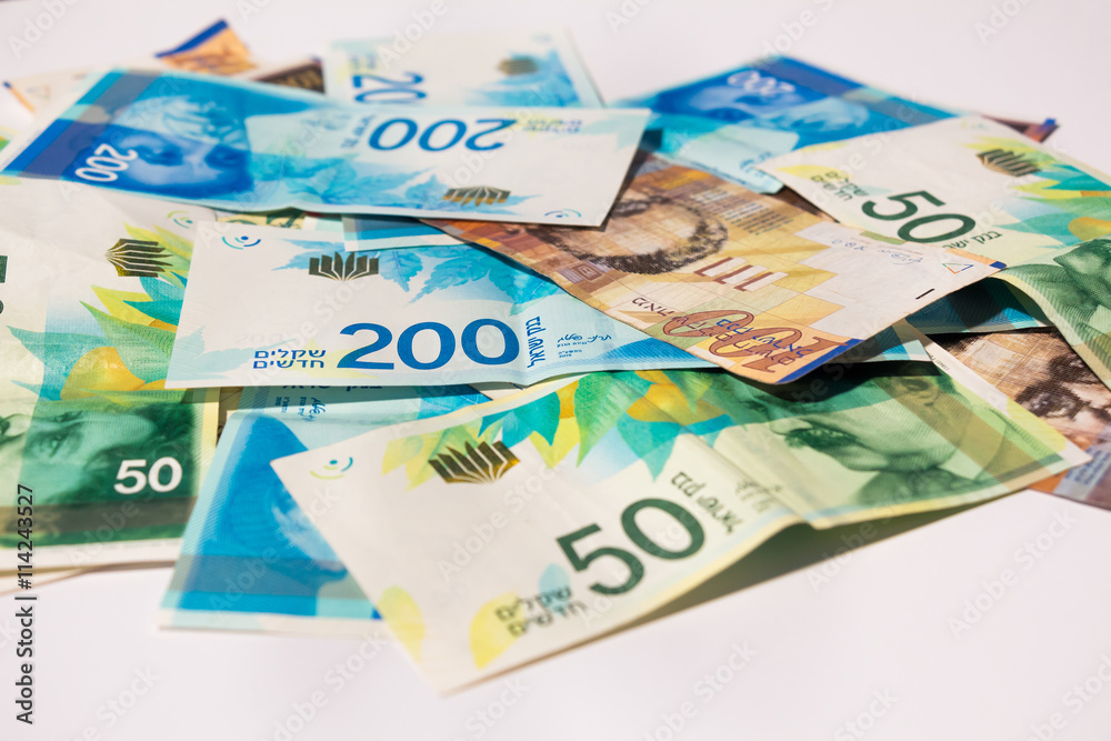 Stack of various of israeli shekel money bills Stack of various of israeli shekel money bills